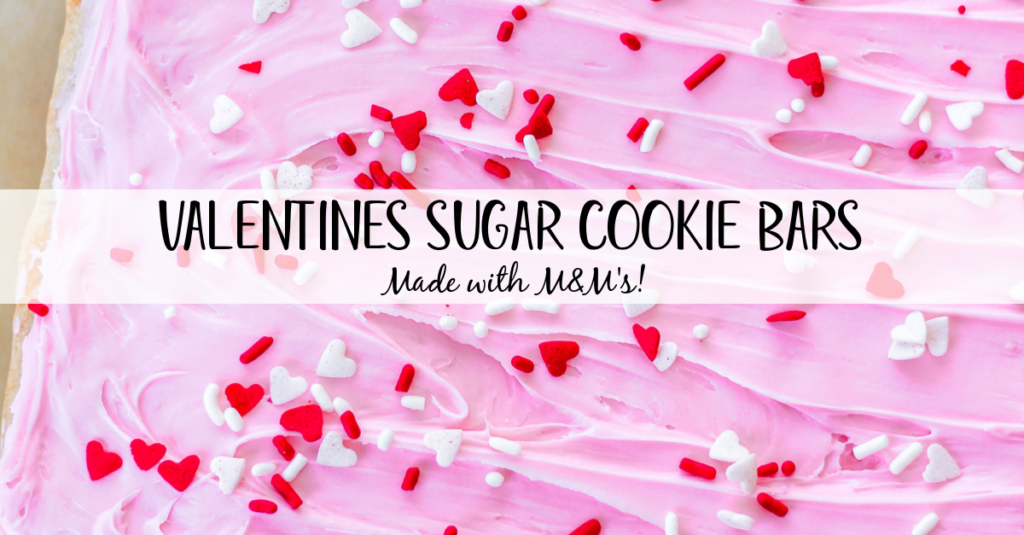 This recipe for M&Ms Valentine's sugar cookie bars are so easy to make and require very few ingredients. This is the only soft and chewy sugar cookie bar recipe you'll ever need, all made in one bowl, and the M&Ms and pink frosting make it fun and festive for a holiday treat! #valentinesdesserts #valentinesbaking #sugarcookies #cookiebars