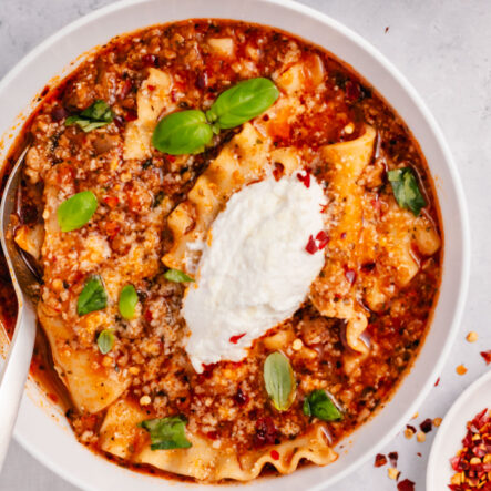 This instant pot lasagna soup only takes 30 minutes, is cooked all in one pot, and can be made gluten free. Made with ricotta, jarred marinara sauce and ground Italian sausage or ground beef, it has all the lasagna flavors you want without taking up much of your time! #healthysouprecipes #lasagnasoup #30minutemeals #instantpotrecipes #instantpotsoup