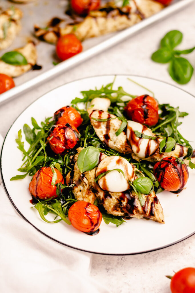 Chicken Caprese Sheet Pan is a super quick and spectacular one-pan meal that’s ready in 30 minutes. This simple dish looks and tastes amazing but it is actually very easy to make and only requires a few ingredients. #healthyrecipes #glutenfreerecipes #healthydinners #fastrecipes
