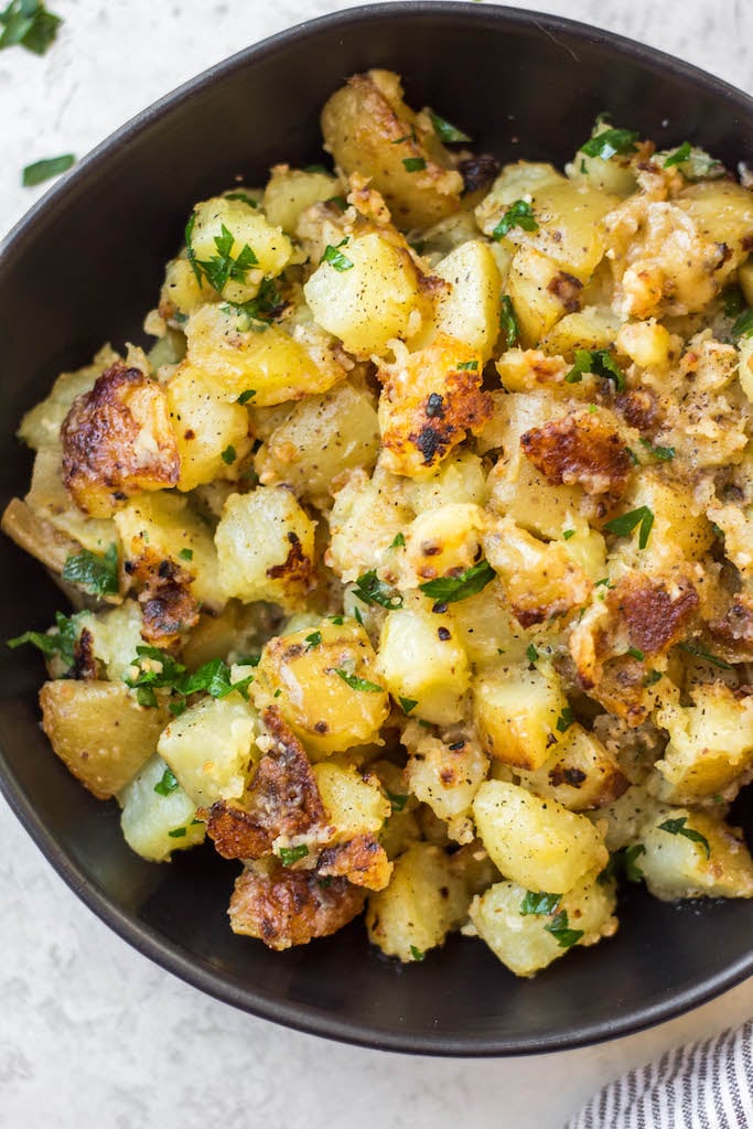 These crispy brabant potatoes are the best side dish to serve with any meal. They're simple to prepare, and made with the perfect amount of butter and garlic. Crispy brabant potatoes are a New Orleans favorite, often called Louisiana Potatoes, and once you have them once you'll see why! #brabantpotatoes #sidedishrecipes #glutenfreesides #potatorecipes